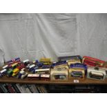 A collection of boxed and unboxed die cast models including Corgi, Days Gone etc.