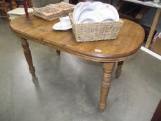 A pine kitchen table.