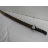 A good old machete in leather scabbard, overall length 54 cm.