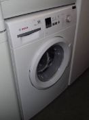 A Bosch Maxx 6 1400 washing machine.