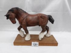 A Beswick shirehorse.