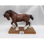 A Beswick shirehorse.