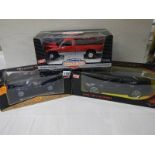 A 1:14 scale radio control BMW, An ERTL Dodge Ram 2500 SLT and a Maisto Aston Martin DB7 Vantage.