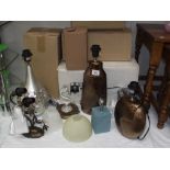 An assortment of table and wall lights/shades etc.