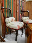 A pair of Edwardian bedroom chairs.