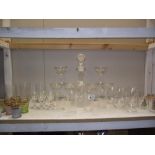 A moulded glass decanter and good selection of vintage drinking glasses