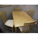 A kitchen table and 4 chairs