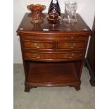 A darkwood stained side chest of drawers (top a/f)