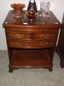 A darkwood stained side chest of drawers (top a/f)