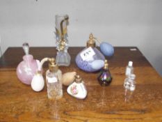 A selection of perfume bottles and atomizers