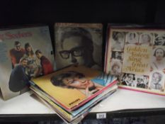 A selection of Lp vinyl records including The Seekers, Buddy Holly etc.
