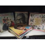 A selection of Lp vinyl records including The Seekers, Buddy Holly etc.