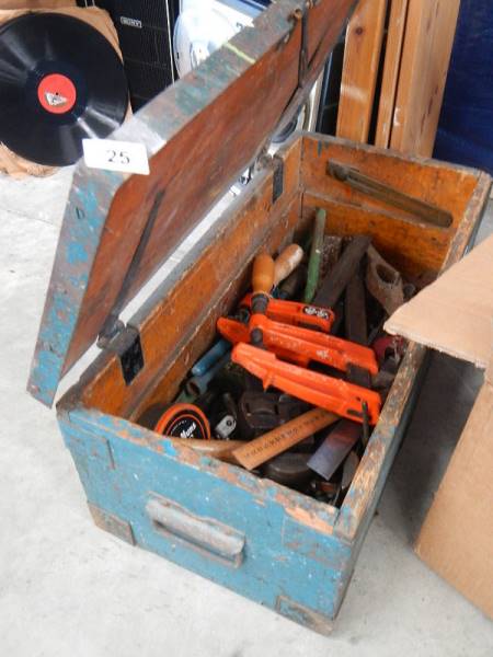 An old pine tool box with tools.