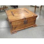 A pine double ended coffee table with storage.