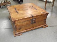 A pine double ended coffee table with storage.