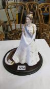 A Royal Worcester figurine 'Her Royal Highness, Princess Margaret in her Coronation Robes',