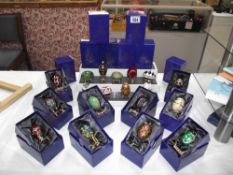 A large collection of Atlas edition decorative Faberge style eggs (1 unboxed)
