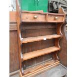 An old pine shelf unit with 2 drawers.