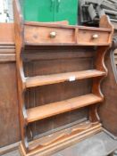 An old pine shelf unit with 2 drawers.