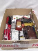 A box of playworn Dinky and Corgi diecast cars