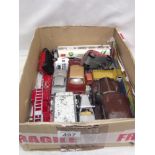 A box of playworn Dinky and Corgi diecast cars