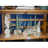 A mixed lot of figures, candlesticks etc.