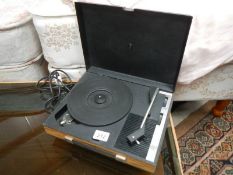A portable record player.