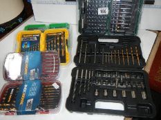 5 boxes of new drills etc.