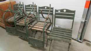 7 old metal and wood garden chairs.