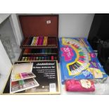 A Scribbilicious 75 pieces stationary set and 1 other and 2 squeeze brush pain sets
