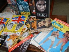 A quantity of boxing memorabilia, some signed.