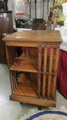 A mahogany revolving book case.