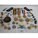 A quantity of medals dedicated to Pt. A Berridge, Lincs. R. No.16881 and a quantity of badges.