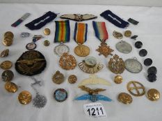 A quantity of medals dedicated to Pt. A Berridge, Lincs. R. No.16881 and a quantity of badges.