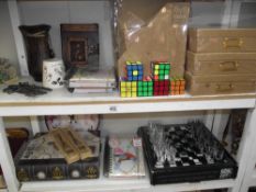 2 shelves of misc. including chess drinking set, etc.
