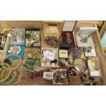 A box of assorted costume jewellery, approximately 40 items.