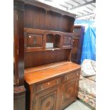 An oak open rack dresser.