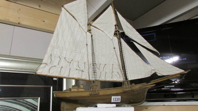 A model sailing boat.