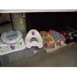 A baby travel cot ball pool,