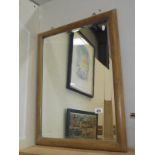 A pine framed bevel edge mirror