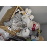 A quantity of stuffed toys including Andrex puppies in wicker basket