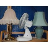 2 table lamps and a desk fan,.