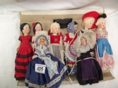 A quantity of vintage costume dolls