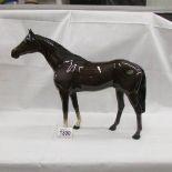 A large Beswick horse.