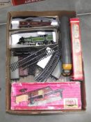 A box with engines, Hornby mail van set, footbridge etc.