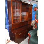 A large mahogany sideboard.