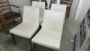 A set of 4 cream G plan chairs.