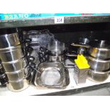 A large selection of stainless steel saucepans,