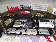 4 shelves of painted wood and metal shabby chic signs and wall hangings