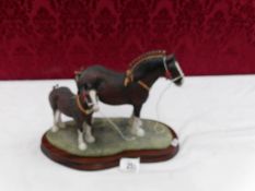 A Border Fine Arts Champion mare and foal, B0334.